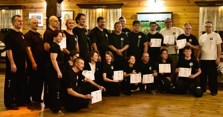 Students display their new certificates of rank at the I Liq Chuan retreat in Poland